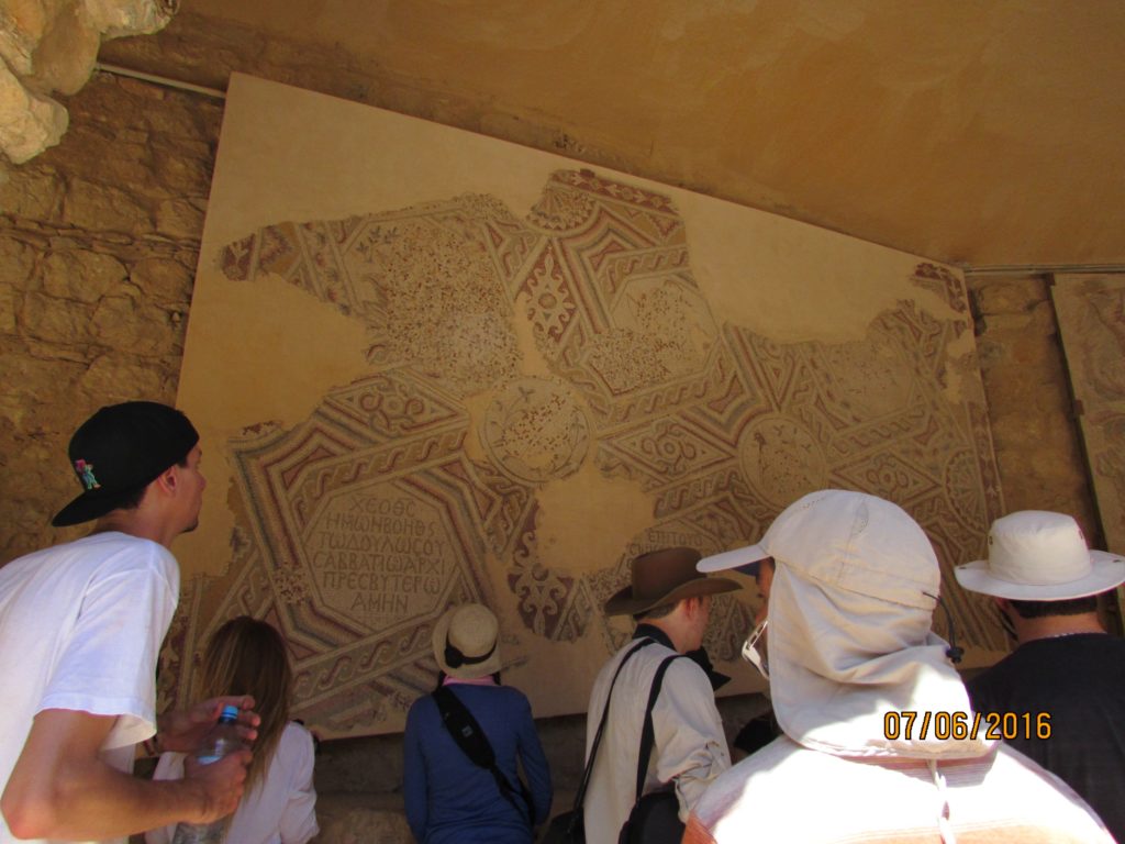 Students taking in one of Madaba's many mosaics as part of the Walking Tour that kicks off the 2016 season at the Town of Nebo Project